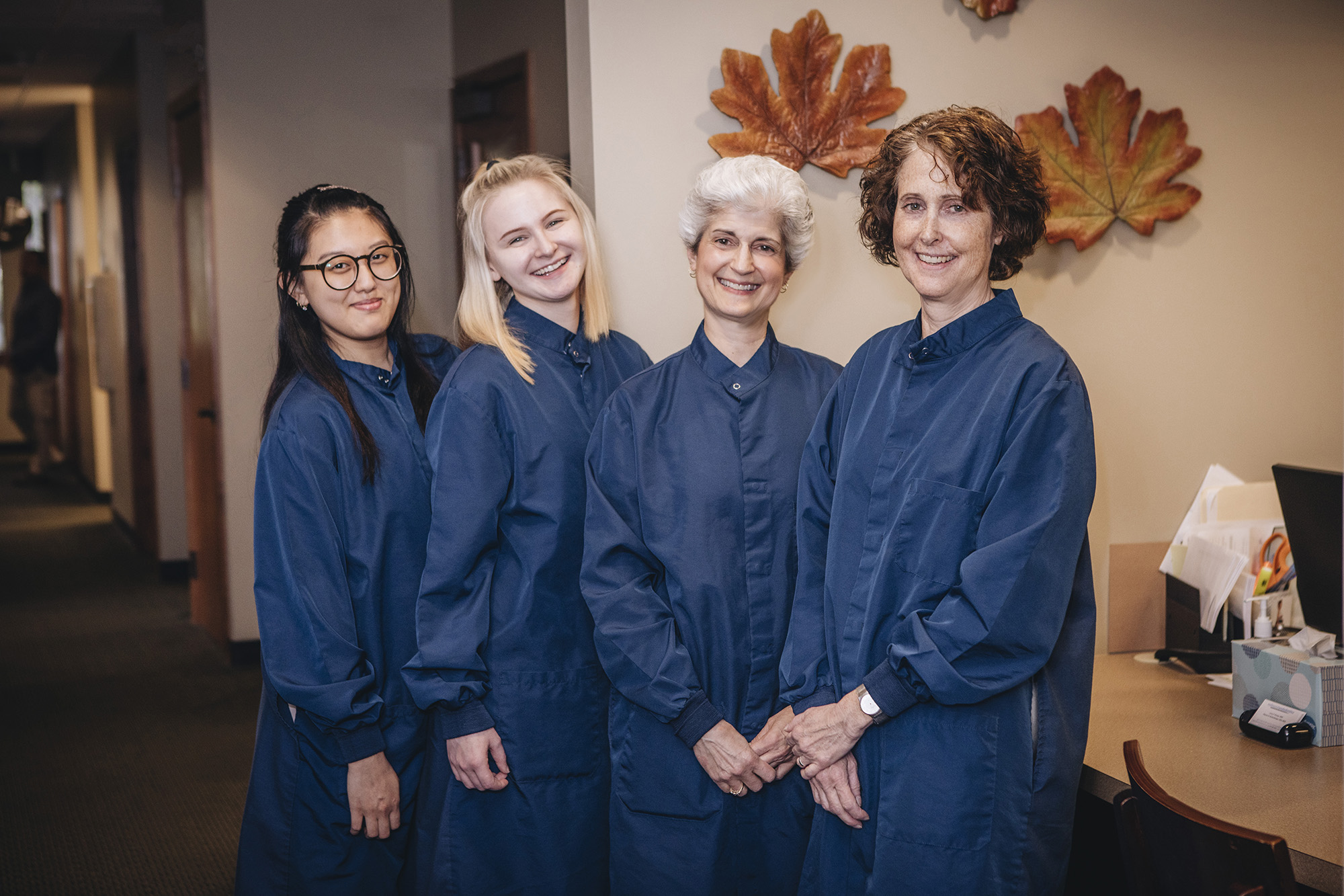 Staff members smiling